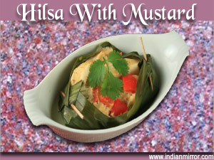 Hilsa With Mustard Smoked In Banana Leaves